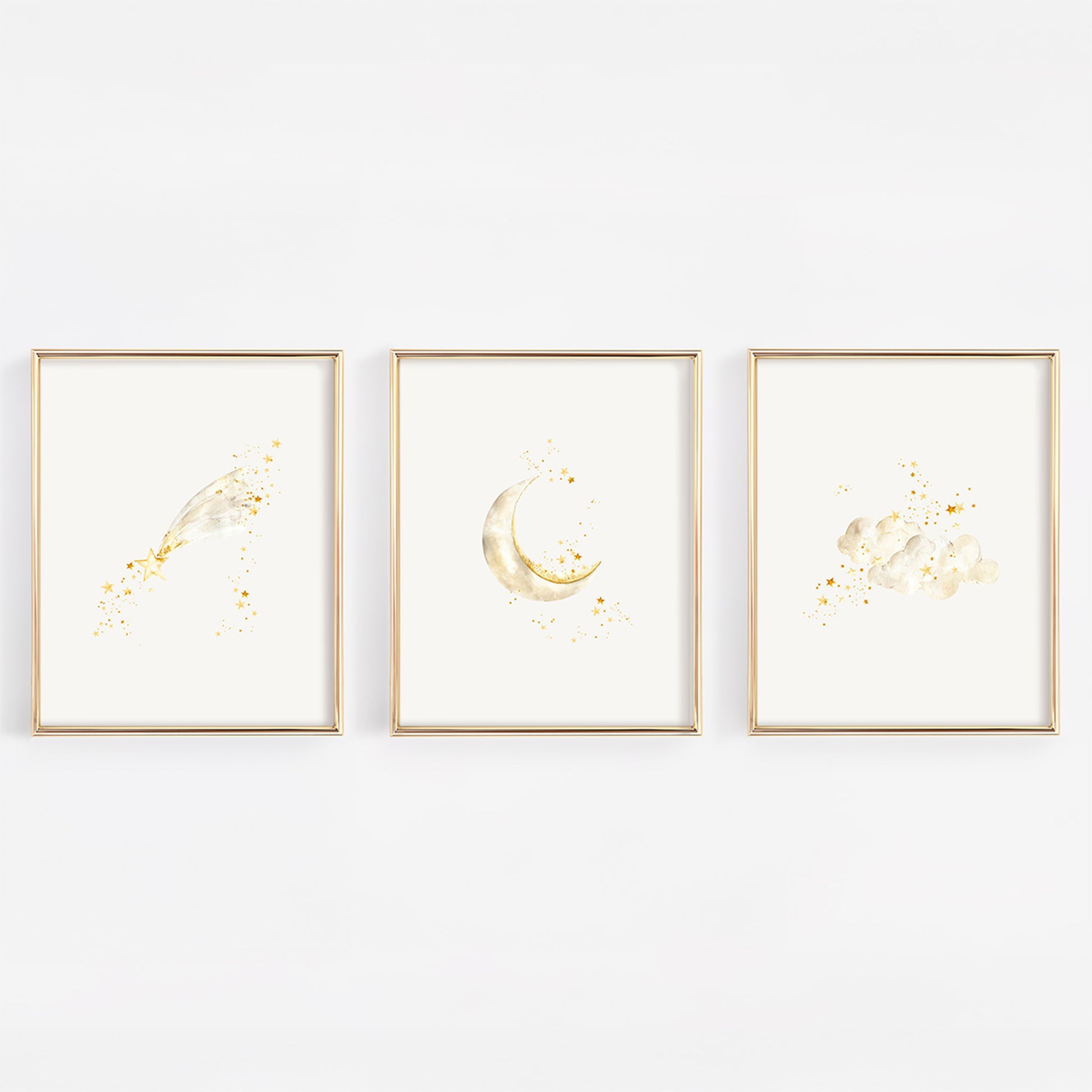 Three framed prints with celestial designs on a white background