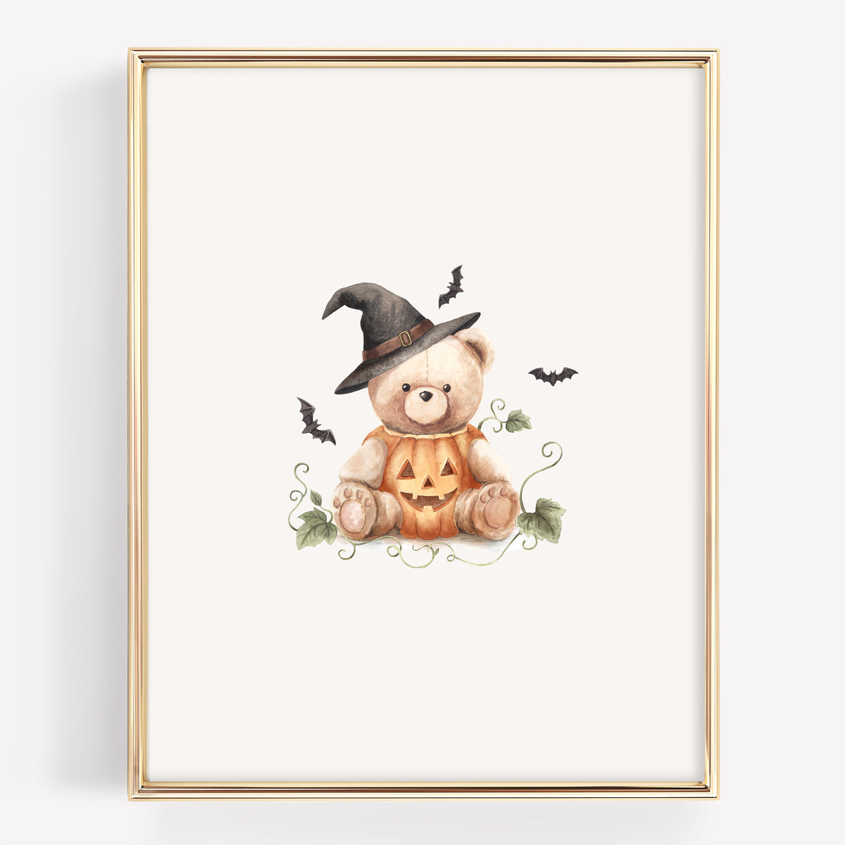Watercolor Halloween teddy bear with a teddy bear sitting in a jack-o-lantern with a witch hat, and bats around it. The pumpkins also have vines.