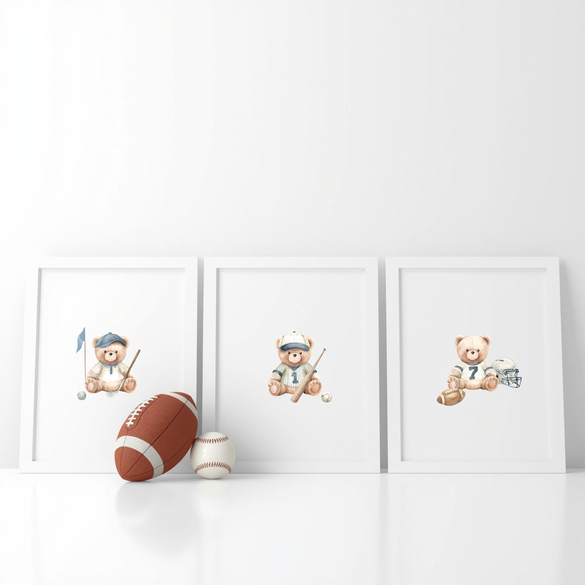 Three baby nursery decoration illustrations of teddy bears in sports poses on a white surface.