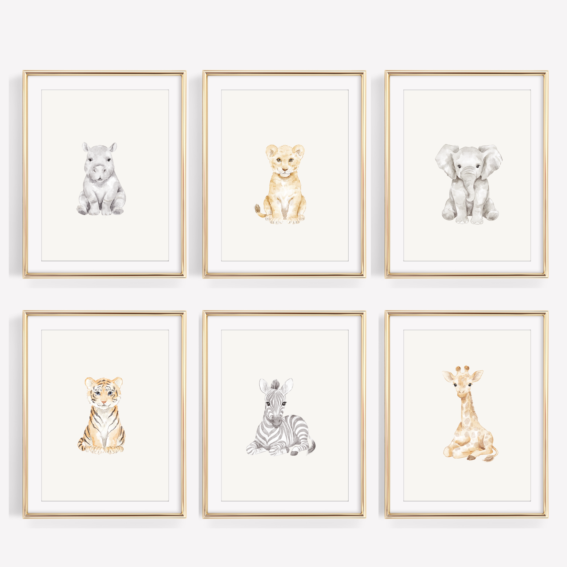 Set of six watercolor safari animal nursery prints featuring a baby lion, giraffe, and elephant on a white wall, neutral jungle themed baby room wall decor.
