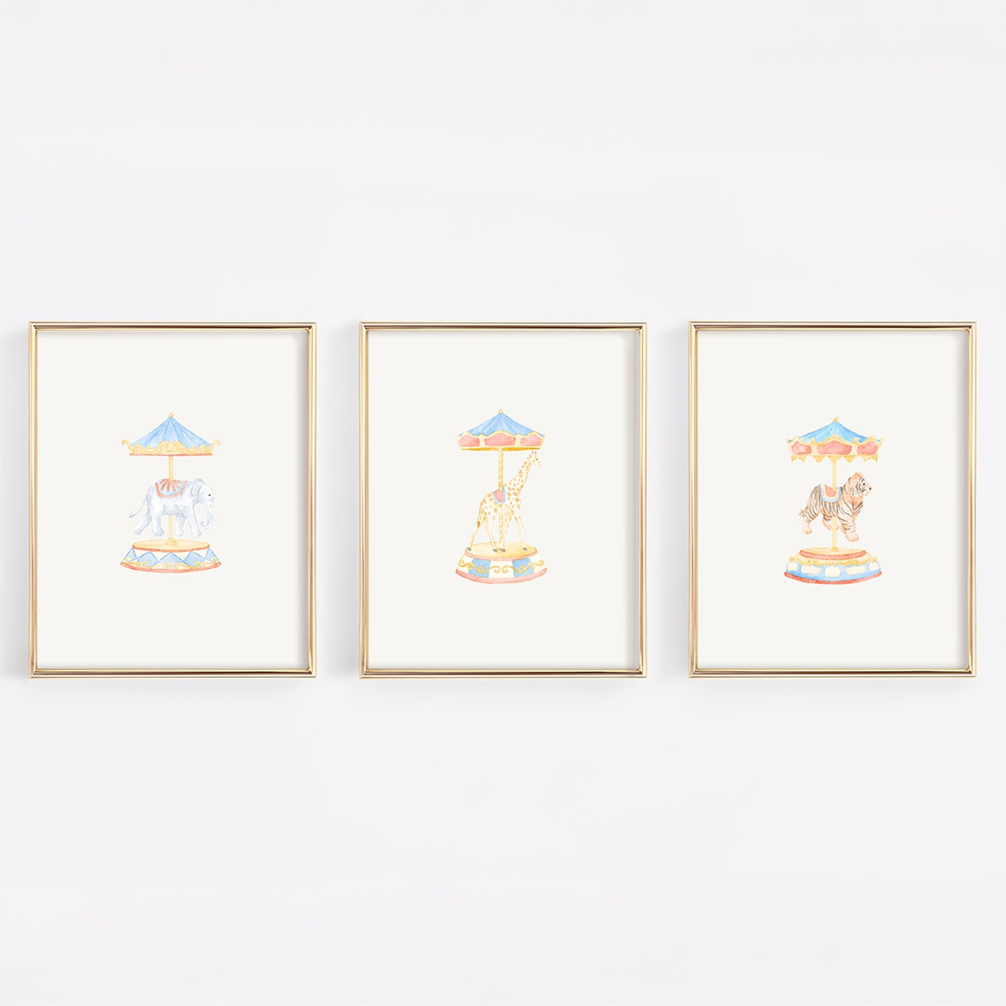 Three framed illustrations of carousel animals including an elephant, giraffe, and tiger.