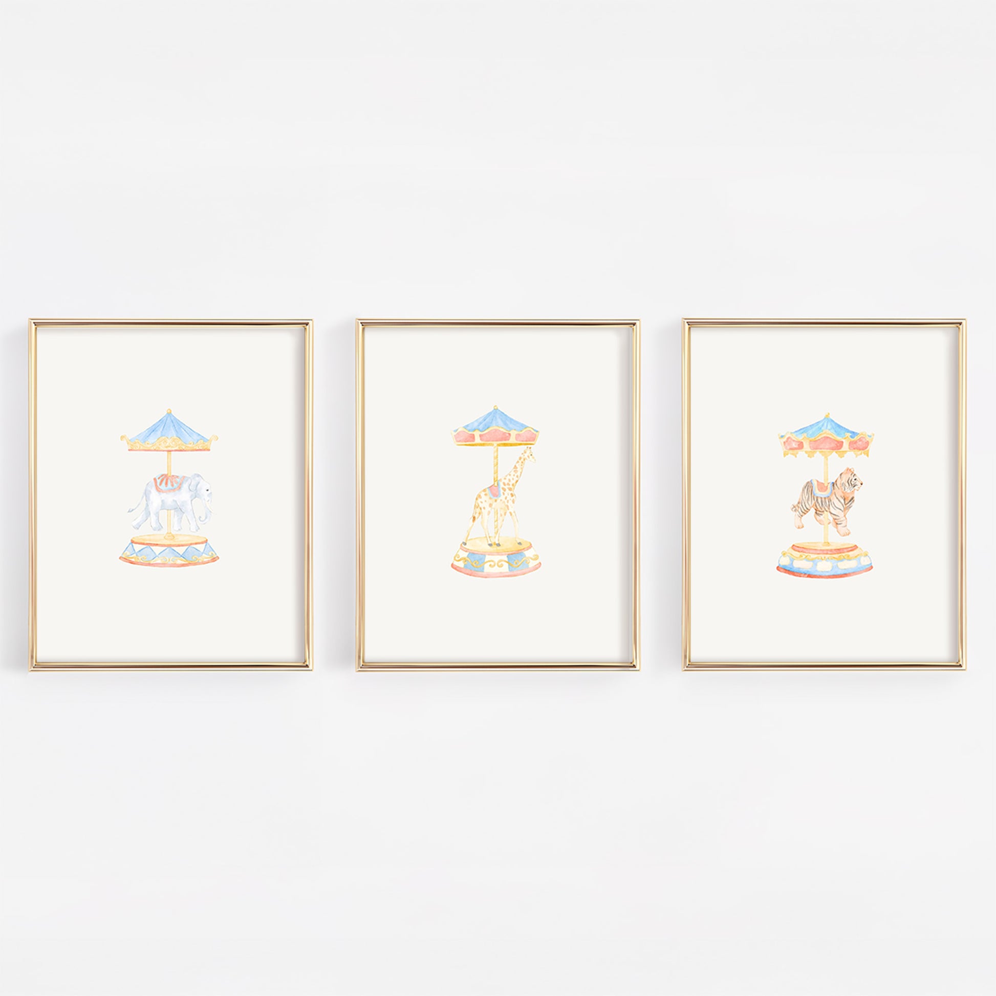 Three framed illustrations of carousel animals including an elephant, giraffe, and tiger.