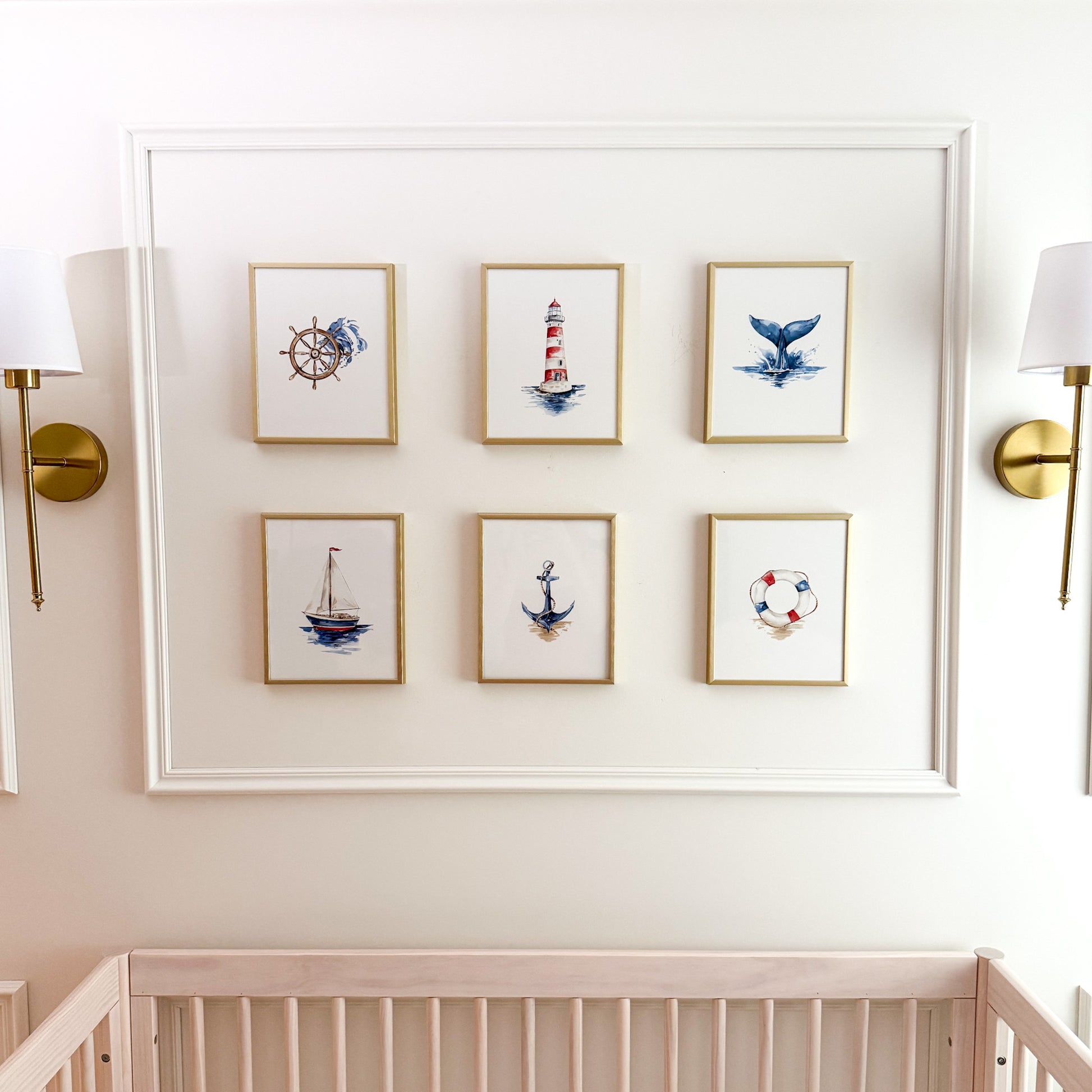 Watercolor nautical nursery prints including a lighthouse, buoy, sailboat, anchor, whale tail and captains wheel.