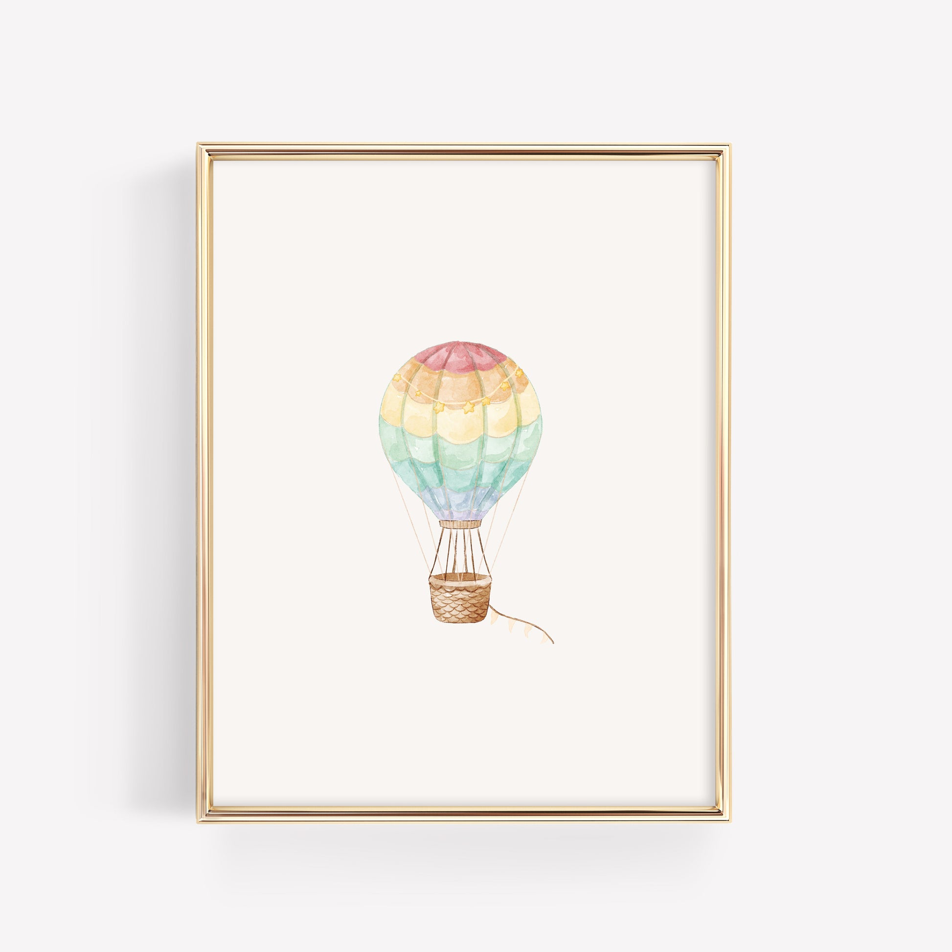Watercolor rainbow hot air balloon nursery art featuring a decorative  tail, coordinating individual print for an adventure nursery theme.