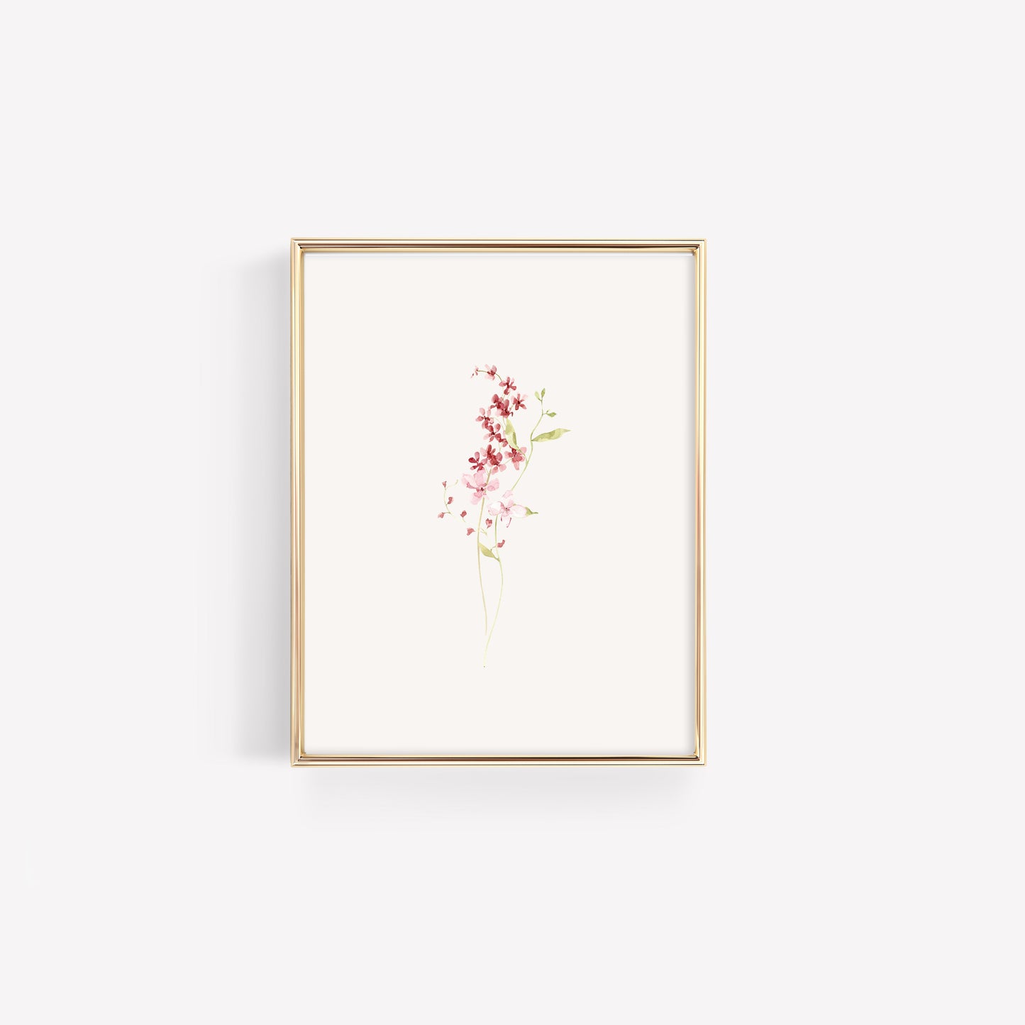 Clean, minimalist botanical print with a simple burgundy wildflower arrangement, styled in a modern metallic gold frame for a sophisticated nursery.