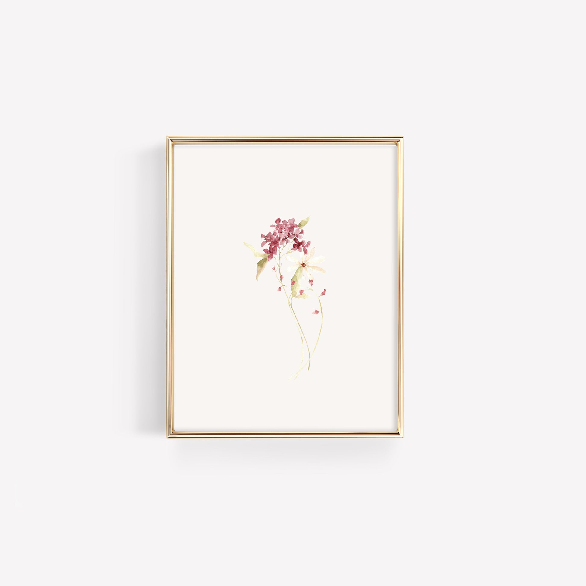 Two coordinating wildflower stems in dusty rose and burgundy, arranged side-by-side in a thin gold frame for a modern botanical nursery look.