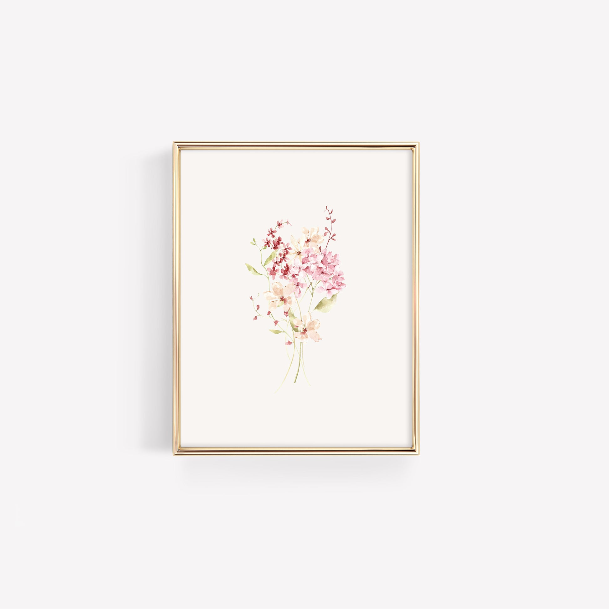 An organic cluster of varied wildflowers in shades of burgundy and rose-pink, centered in a gold frame with a classic white mat border.