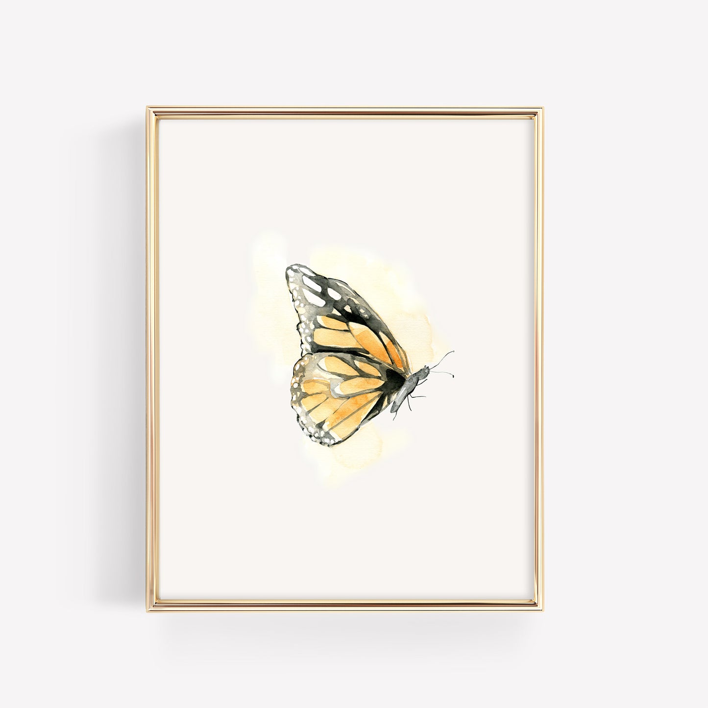 Whimsical watercolor monarch butterfly illustration with a dreamy orange aura, styled in a metallic gold frame as part of a 3-piece celestial garden set.