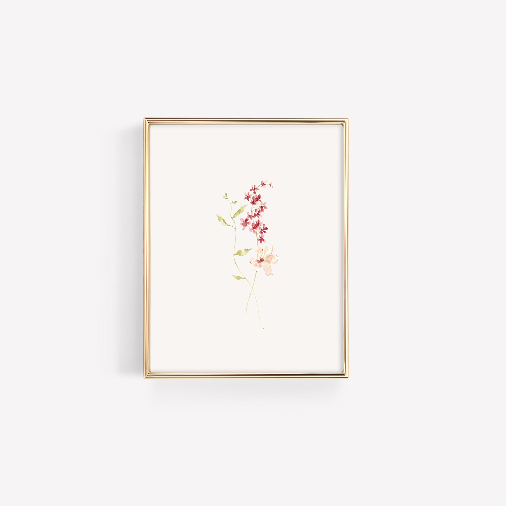 A minimalist gold-framed nursery print featuring a simple sprig of deep burgundy wildflowers with soft watercolor details and clean white space.