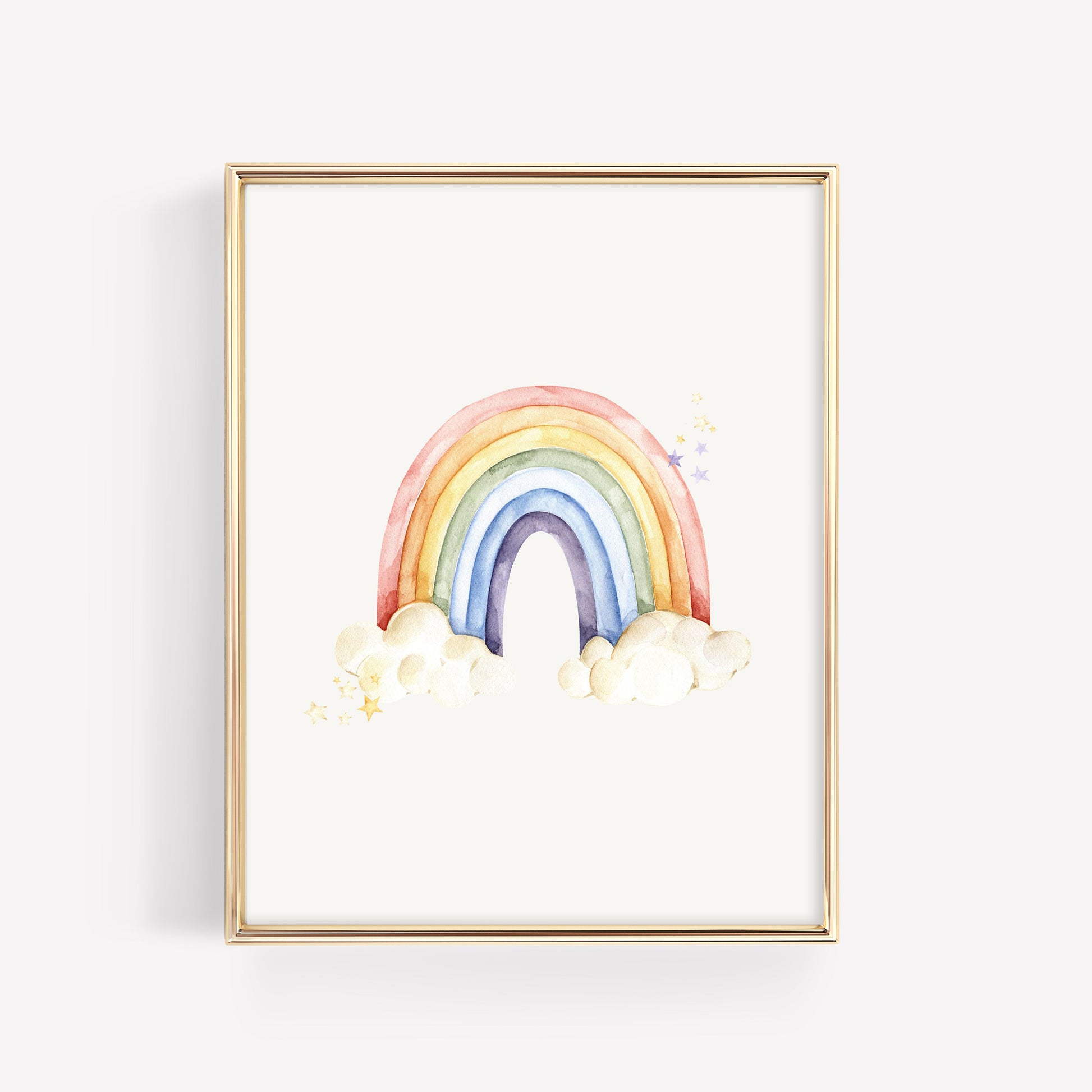 A framed watercolor-style rainbow art print with soft pastel bands in pink, orange, yellow, green, blue, and purple, plus white clouds at the bottom, shown in a thin gold frame against a light off-white background.