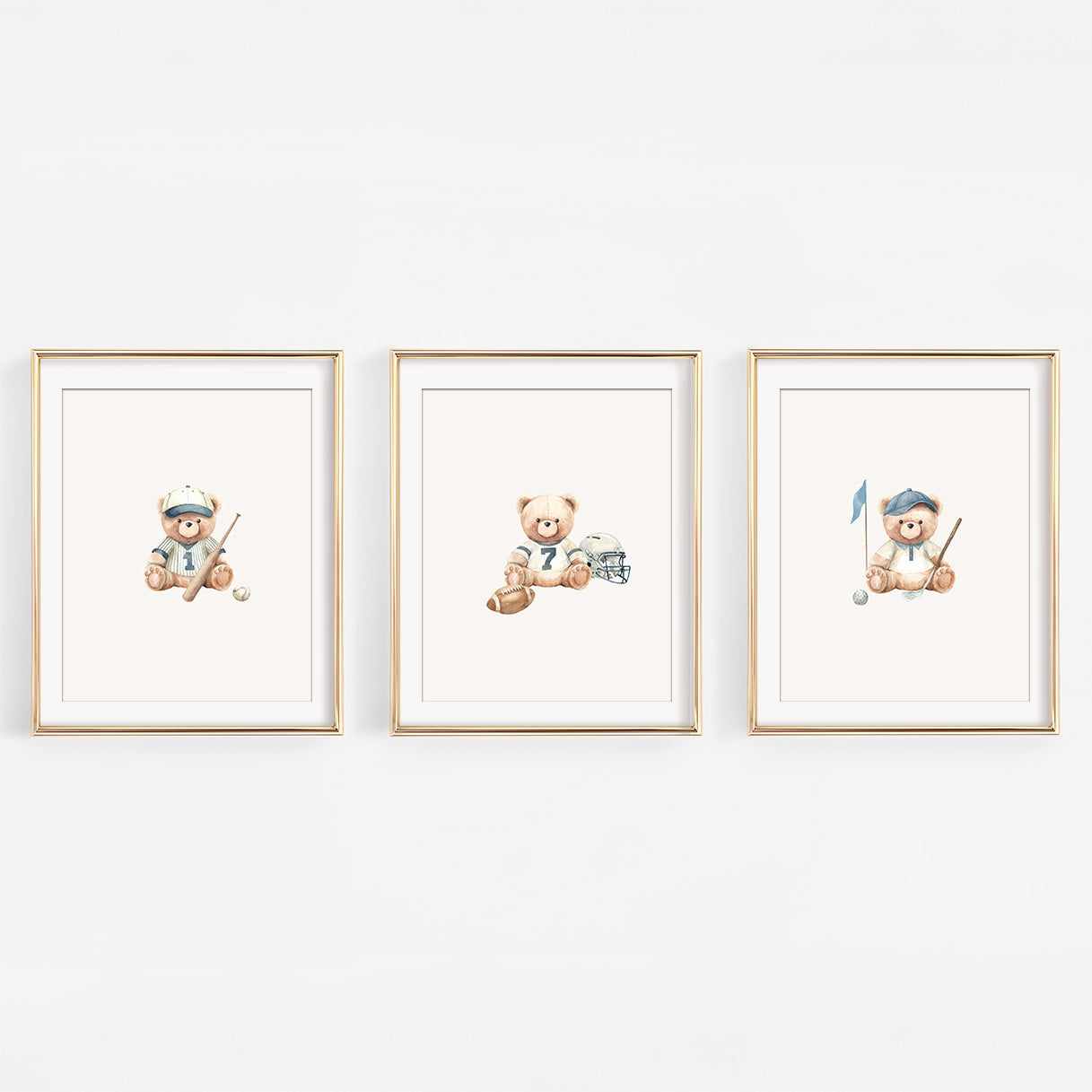 Set of three watercolor varsity sports teddy bear nursery prints featuring baseball, golf, and football themes. Vintage sportsman gallery wall for a baby boy's room.