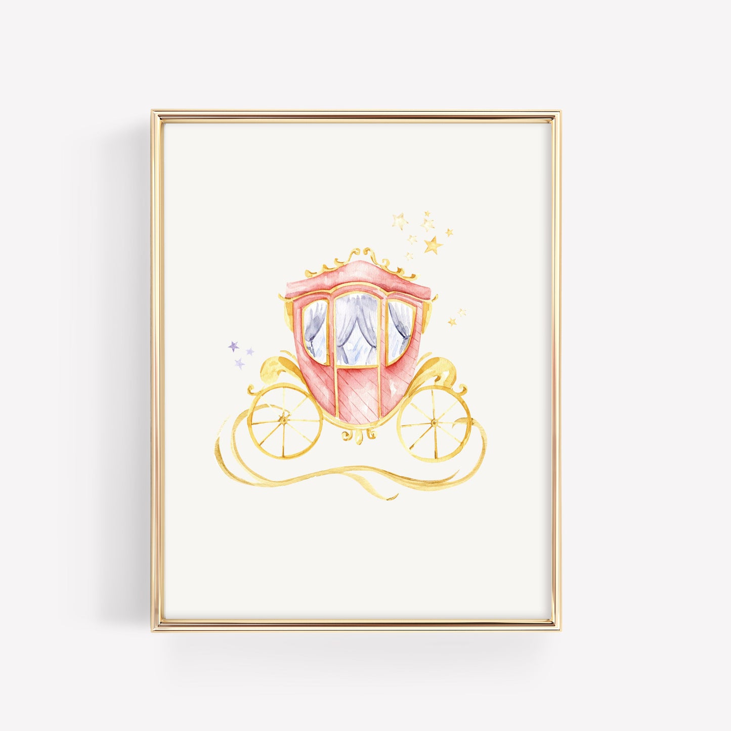 A framed watercolor art print of a pink and gold fairy tale carriage on a white background, enclosed in a thin gold frame and shown against a light gray wall.