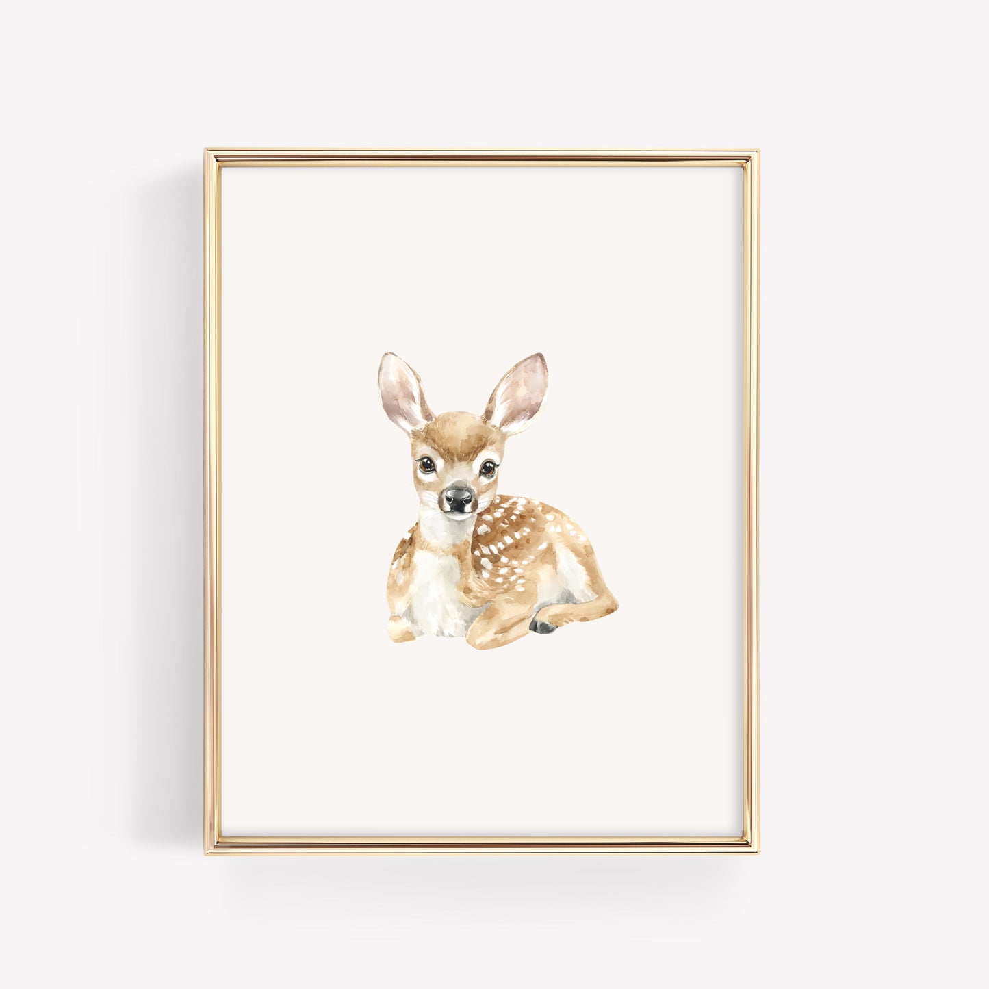 Framed artwork of a baby deer on a white background