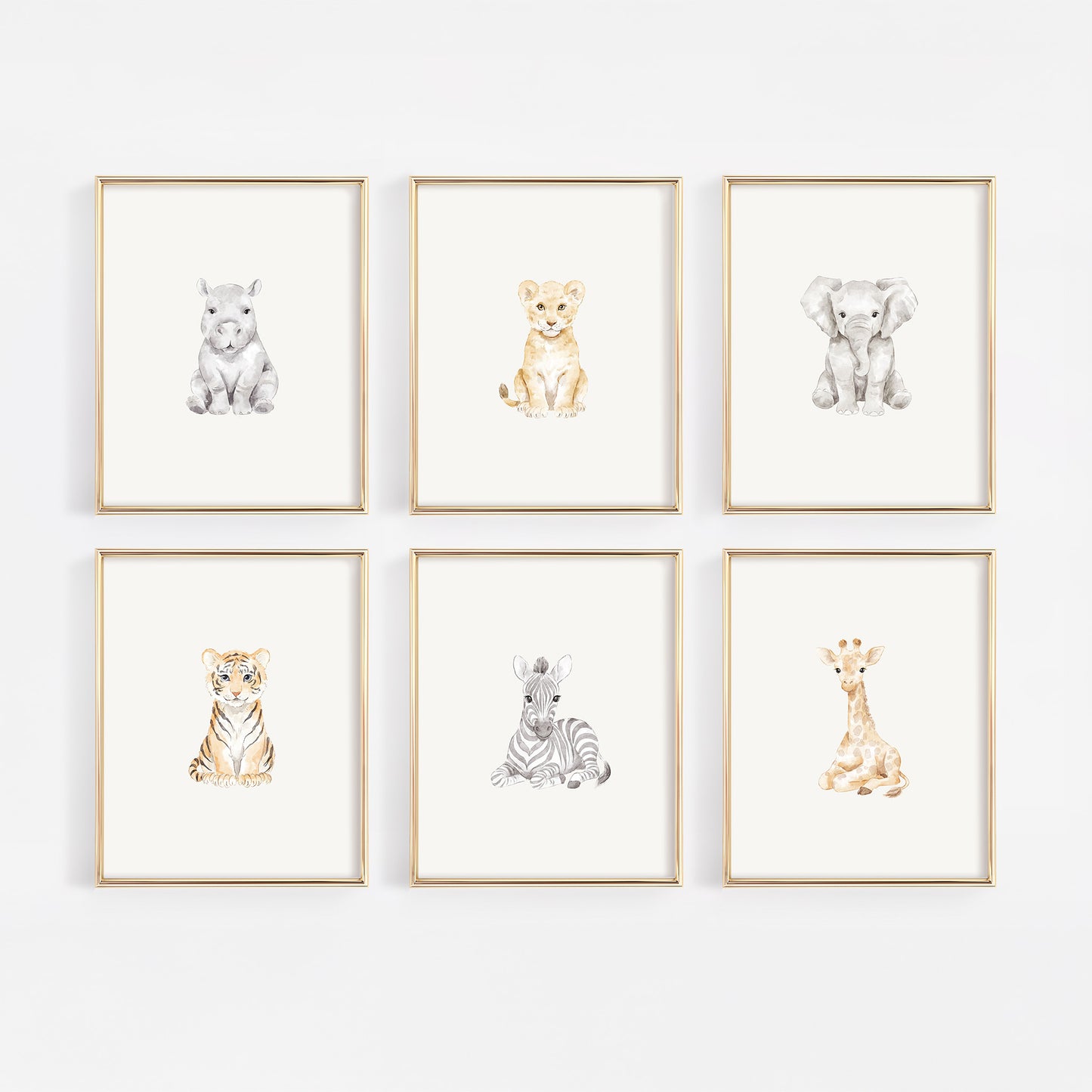 Set of six framed safari animal prints on a white wall including rhino, lion, elephant, tiger, zebra, and giraffe