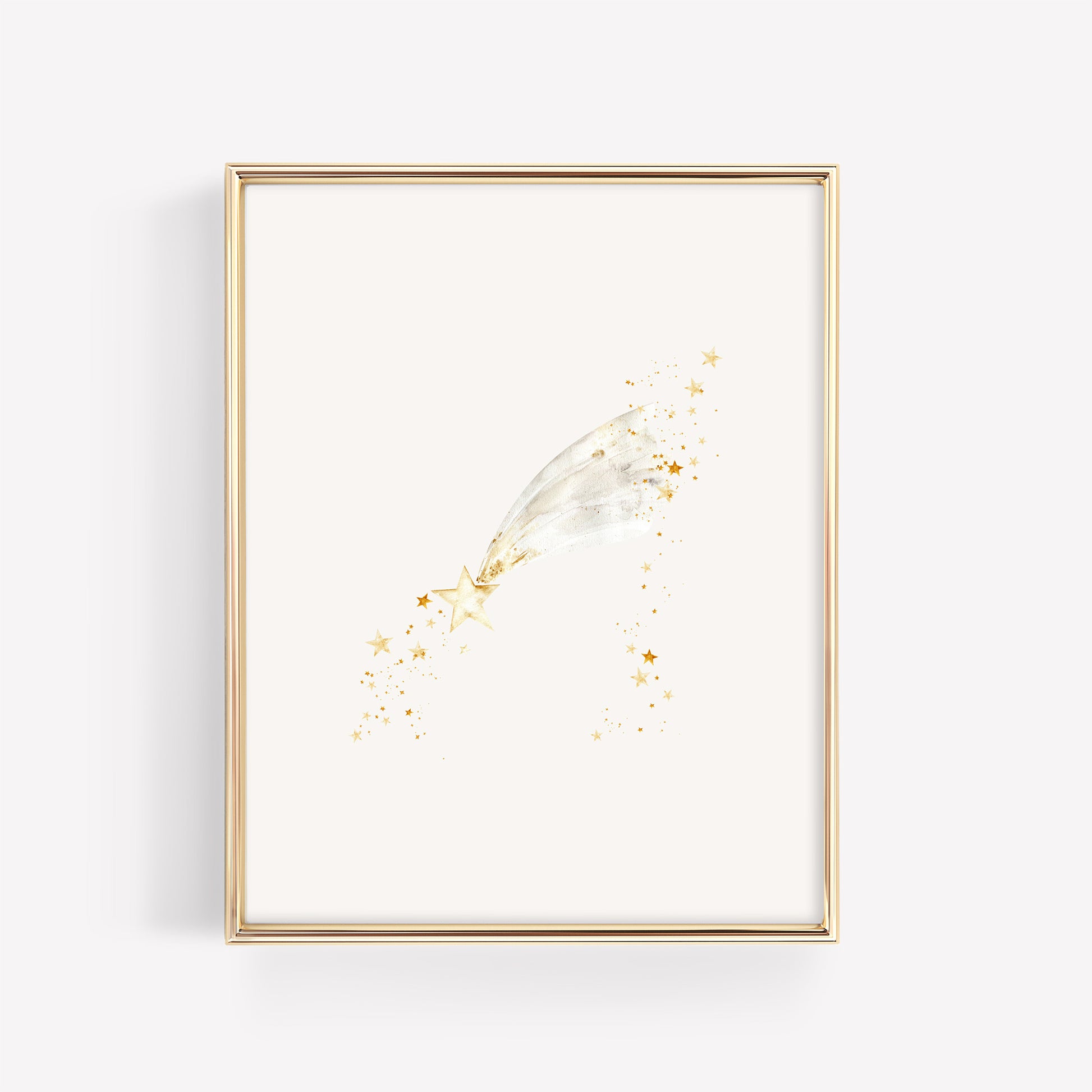 A whimsical shooting star with a soft, flowing trail and tiny surrounding stars, showcased in a metallic gold frame on a crisp white background.